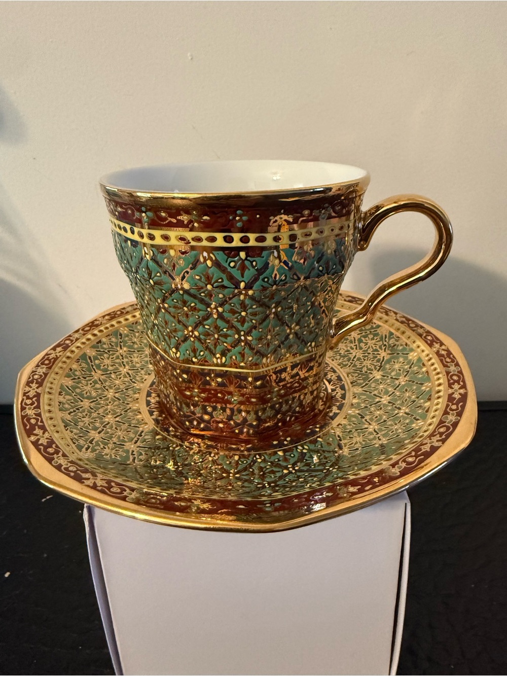 PIPATANA BENJARONG Green red and Gold Porcelain Teacup with Saucer.